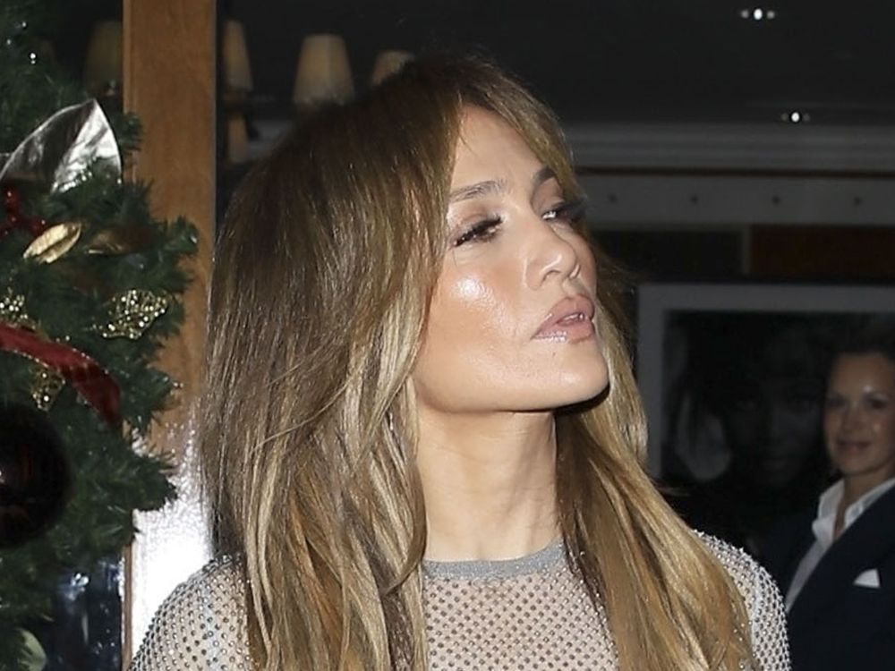 Jennifer Lopez's Sheer Bedazzled Bra-Baring Top Embraced 2024's Biggest Holiday Trend