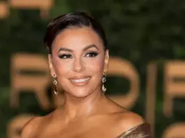 Eva Longoria's Plunging Metallic Gold Gown Is Perfect for the Holidays