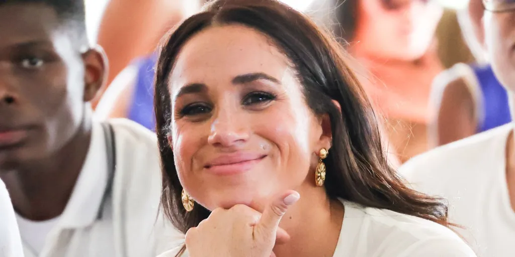 Meghan Markle's Pink Baby Shower Dress Strayed From Her Signature Neutrals