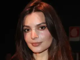 Emily Ratajkowski Wore a Plunging Slinky LBD for Christmas